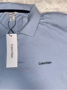 Calvin Klein Men's Pale Blue Polo with Black Logo